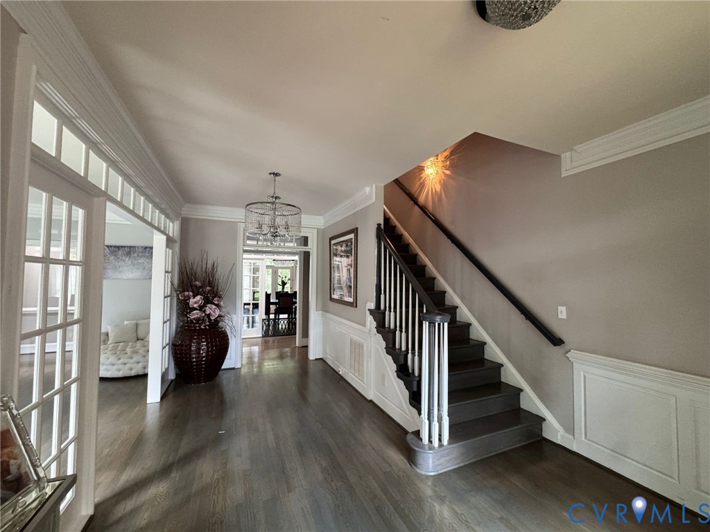 3231 Queens Grant Drive Midlothian, VA 23113 - Photo 2 of 48 a view of a livingroom with wooden floor and furniture