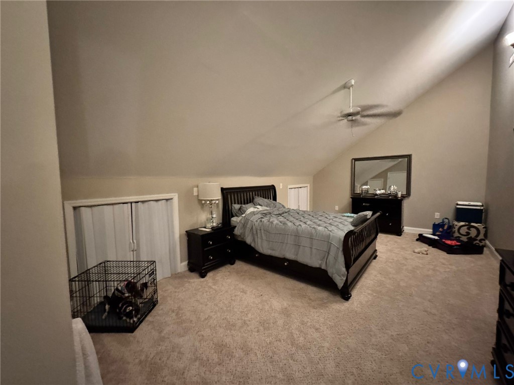 3231 Queens Grant Drive Midlothian, VA 23113 - Photo 24 of 48 a bedroom with a bed and a couch