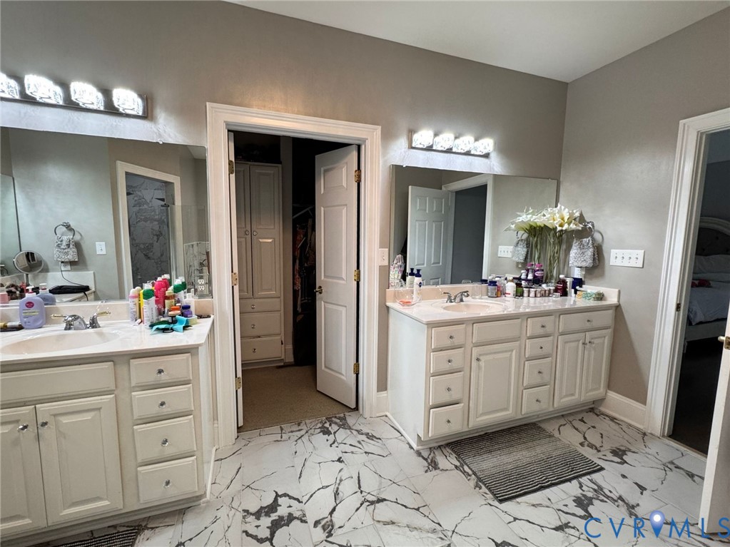 3231 Queens Grant Drive Midlothian, VA 23113 - Photo 35 of 48 a bathroom with a sink vanity and a mirror