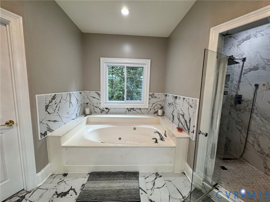 3231 Queens Grant Drive Midlothian, VA 23113 - Photo 36 of 48 a spacious bathroom with a bathtub and shower