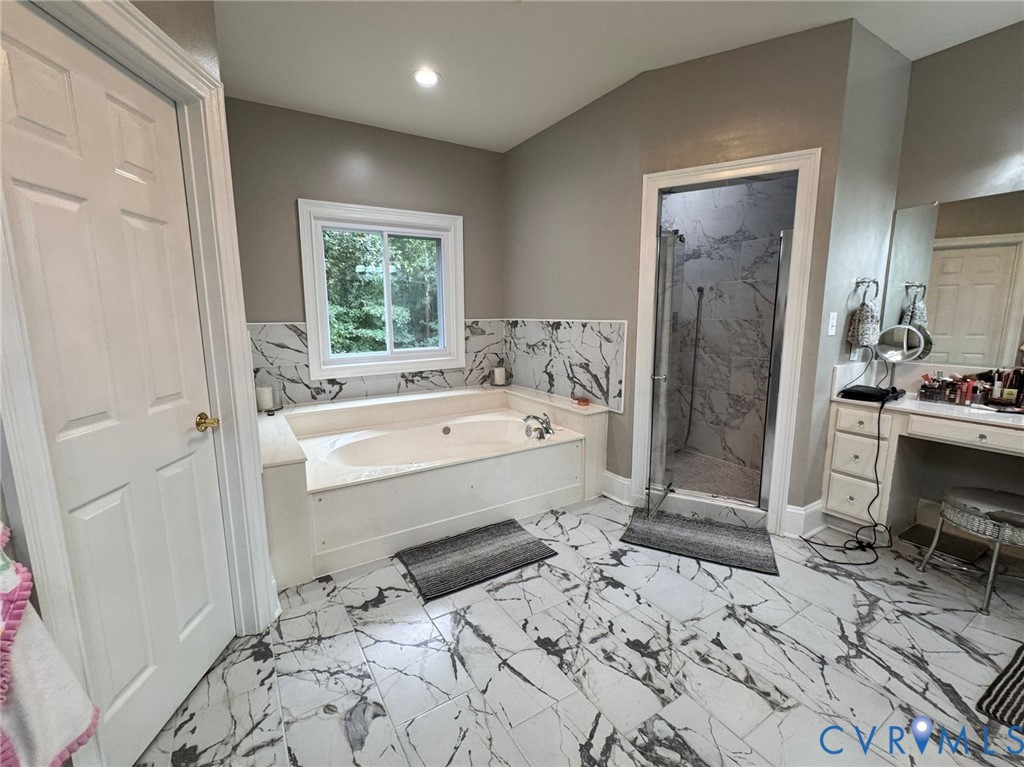 3231 Queens Grant Drive Midlothian, VA 23113 - Photo 37 of 48 a bathroom with a bathtub sink and a toilet