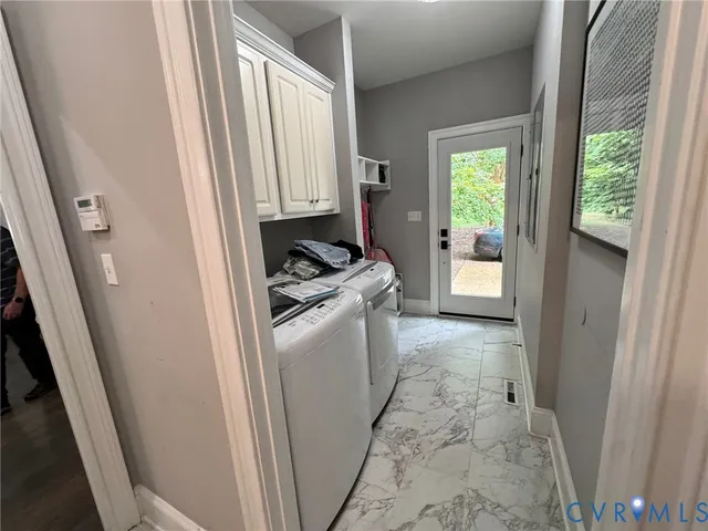 a view of a storage and utility room with a sink