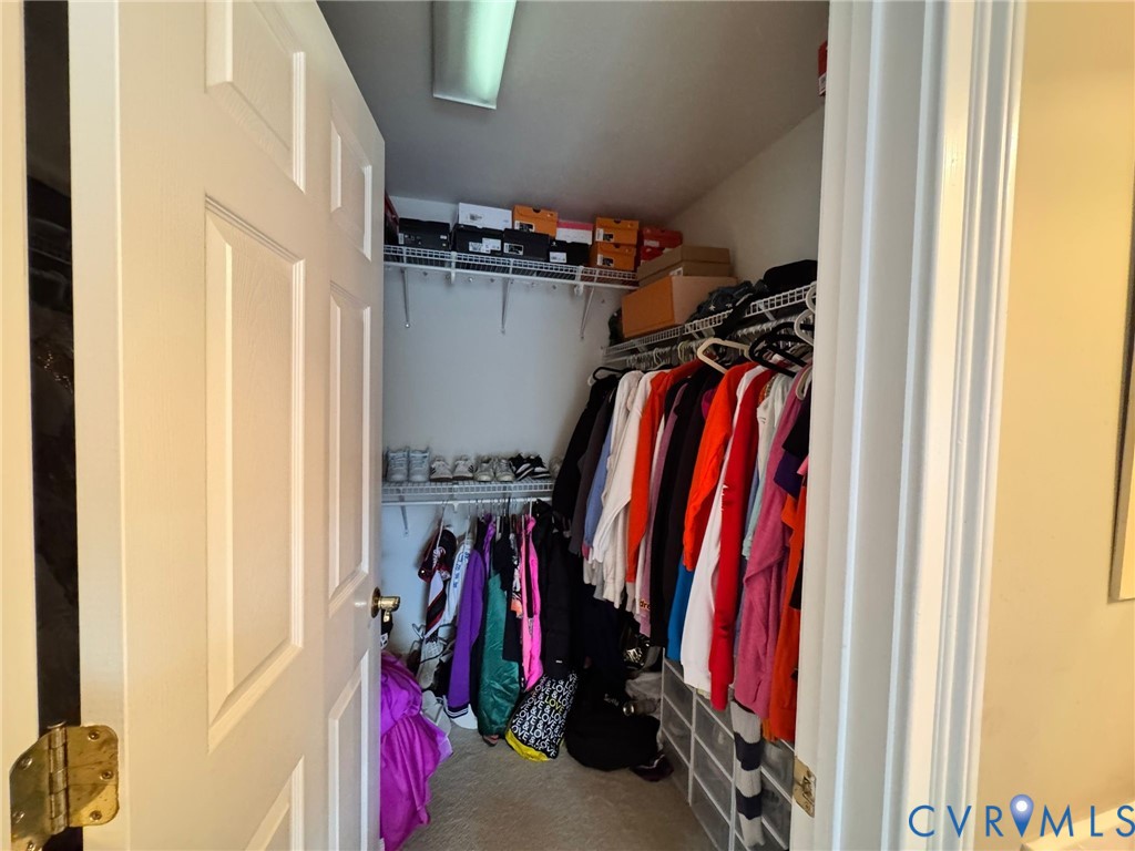 3231 Queens Grant Drive Midlothian, VA 23113 - Photo 40 of 48 a view of walk in closet with clothes