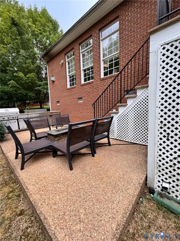 3231 Queens Grant Drive Midlothian, VA 23113 - Photo 45 of 48 a building outdoor space with patio furniture