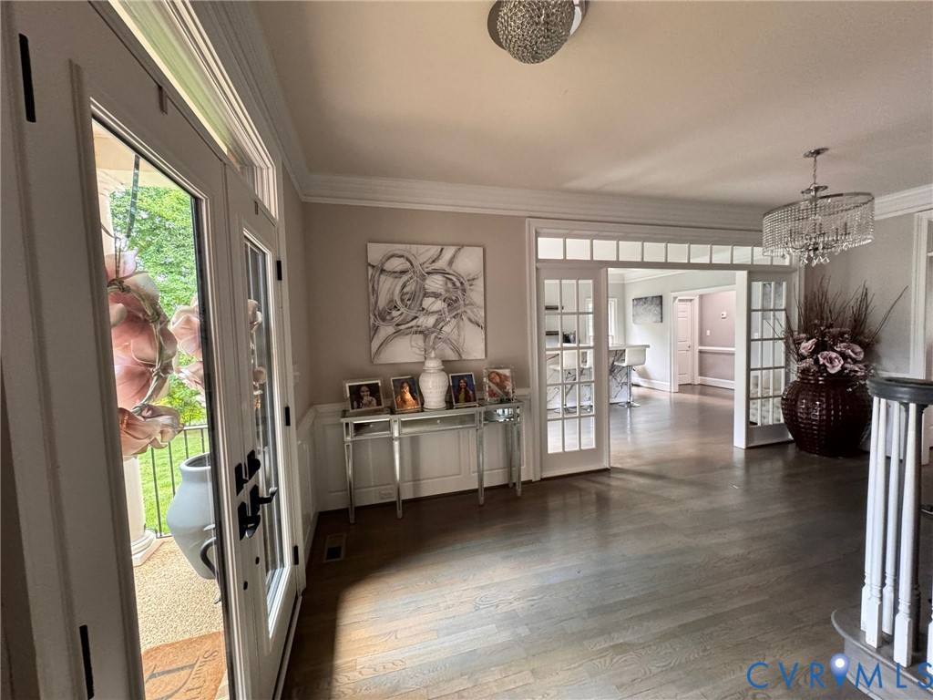 3231 Queens Grant Drive Midlothian, VA 23113 - Photo 7 of 48 a view of a living room and hardwood floor