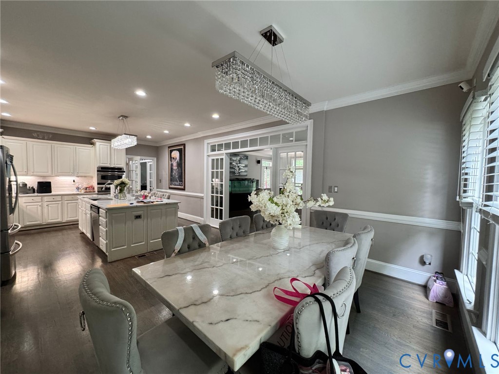 3231 Queens Grant Drive Midlothian, VA 23113 - Photo 10 of 48 a view of a dining room with furniture and wooden floor