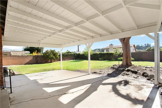 a view of open space with a big yard