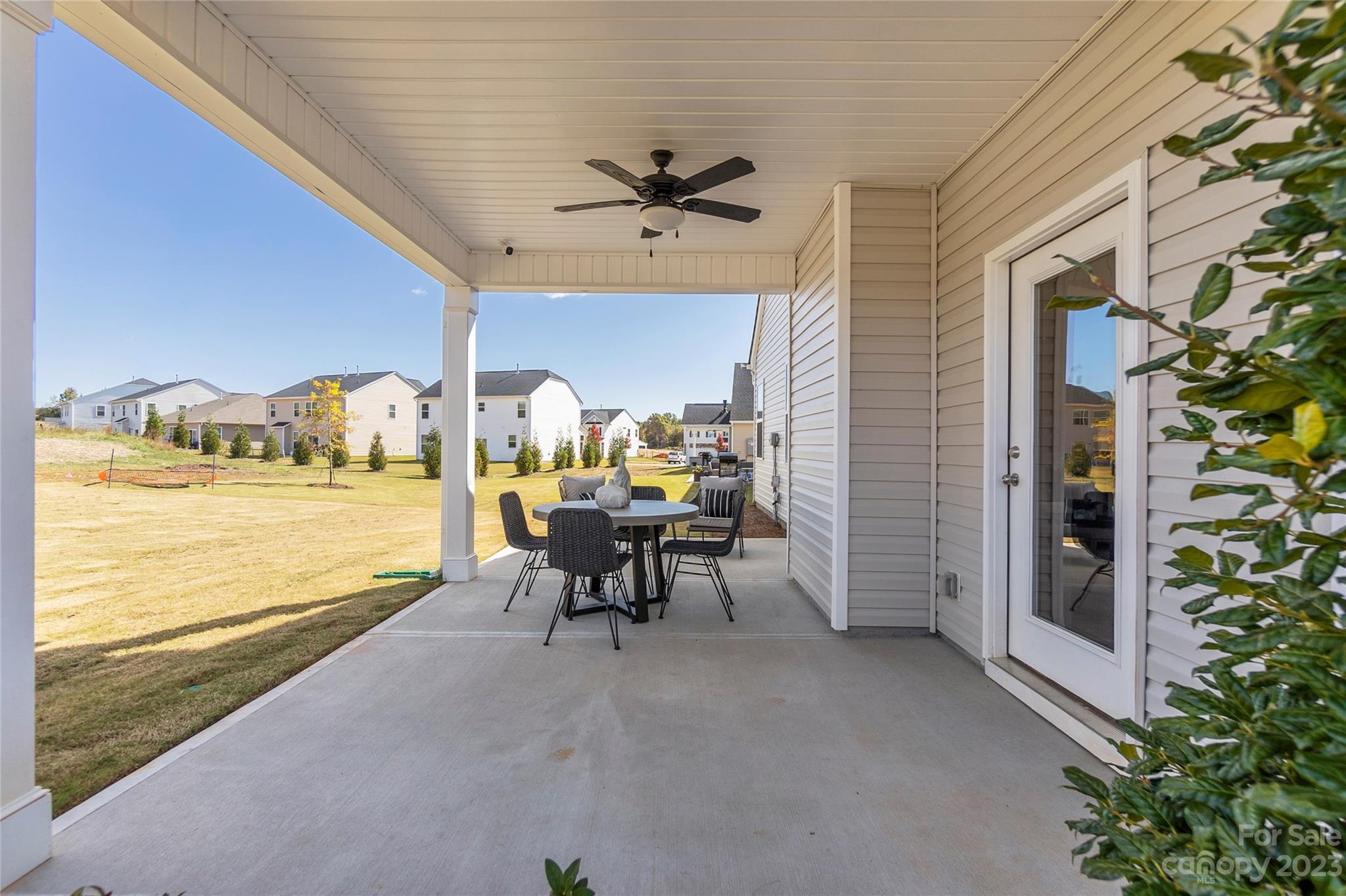 3107 Laurel Brook Drive Denver, NC 28037 - Photo 24 of 31 a view of a patio with a table and chairs