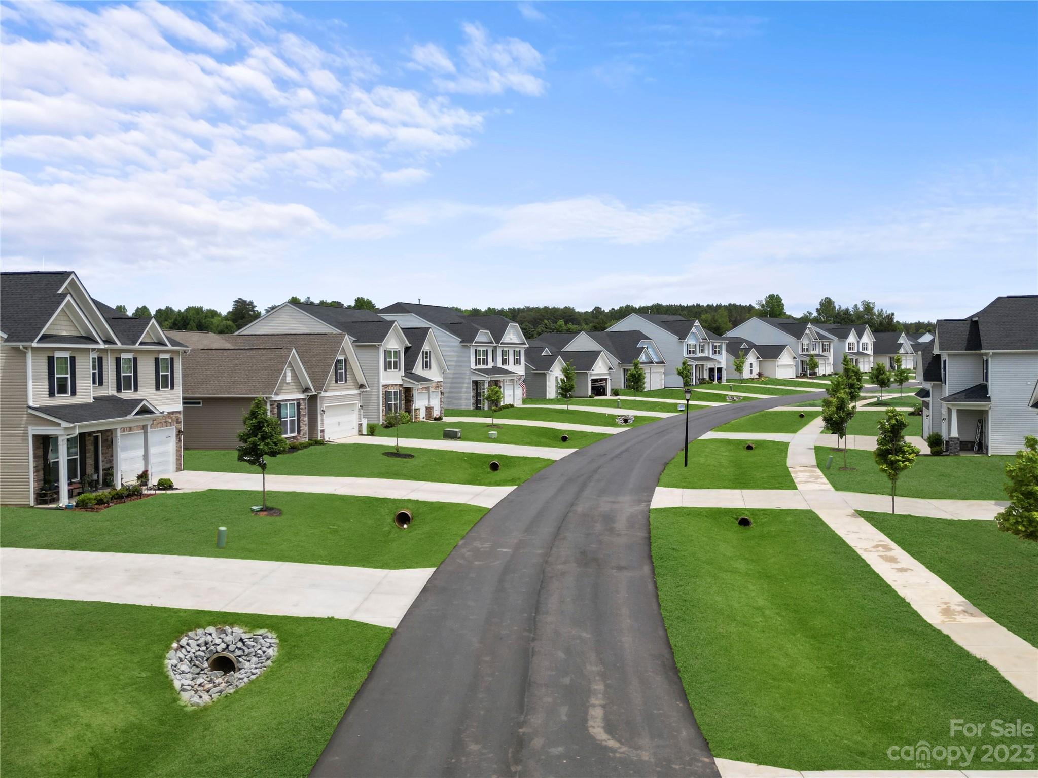 3107 Laurel Brook Drive Denver, NC 28037 - Photo 30 of 31 an aerial view of a house with a big yard