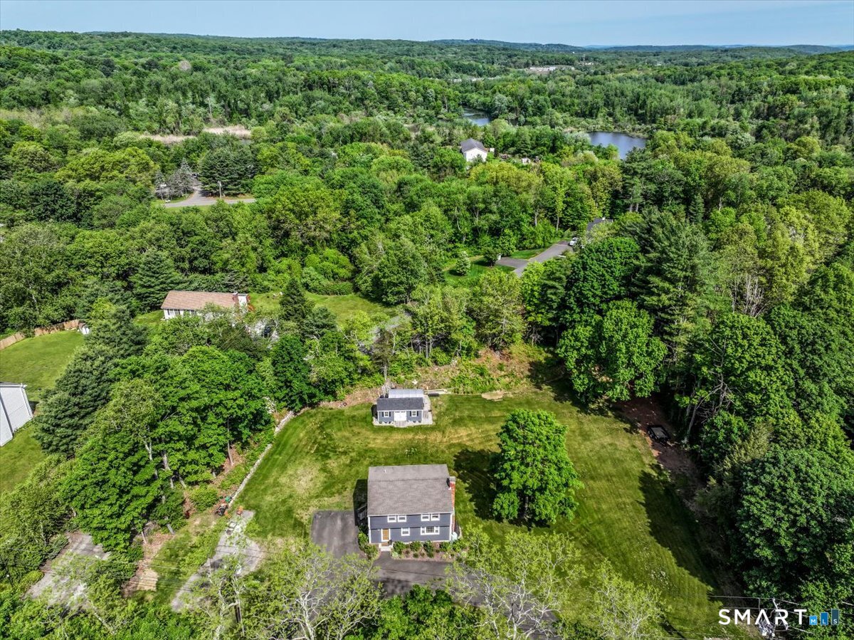 19 Botsford Hill Road Newtown, CT 06470 - Photo 40 of 40 an aerial view of a house with a yard