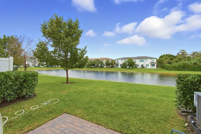 a view of a lake with a city