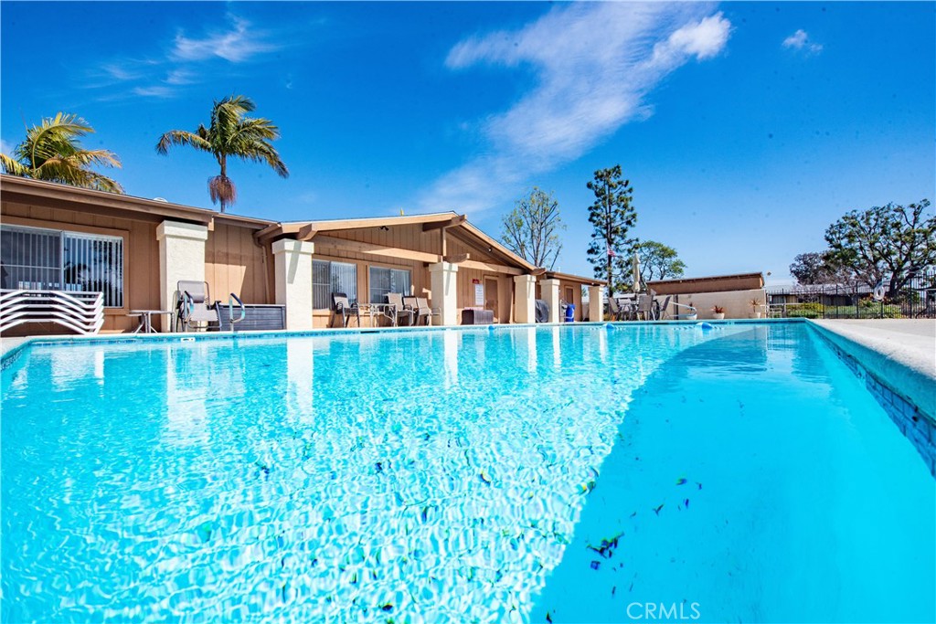 4433 Albatross Way Oceanside, CA 92057 - Photo 40 of 47 a view of a house with a yard