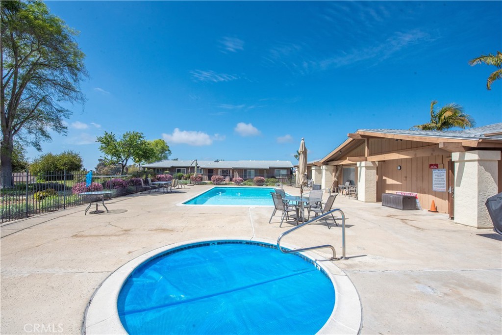 4433 Albatross Way Oceanside, CA 92057 - Photo 41 of 47 a view of a swimming pool with a patio