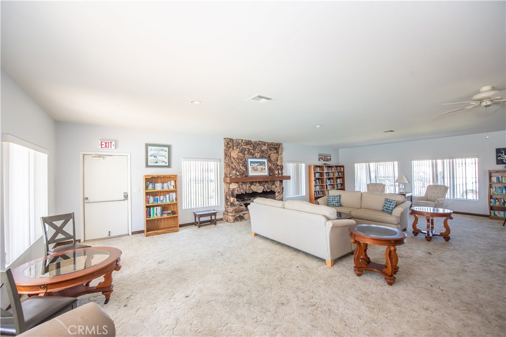 4433 Albatross Way Oceanside, CA 92057 - Photo 43 of 47 a living room with furniture and a wooden floor