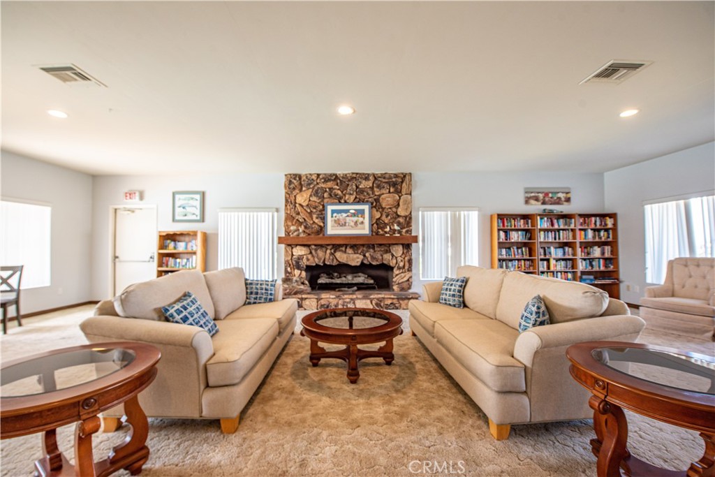 4433 Albatross Way Oceanside, CA 92057 - Photo 44 of 47 a living room with furniture a rug and a large window