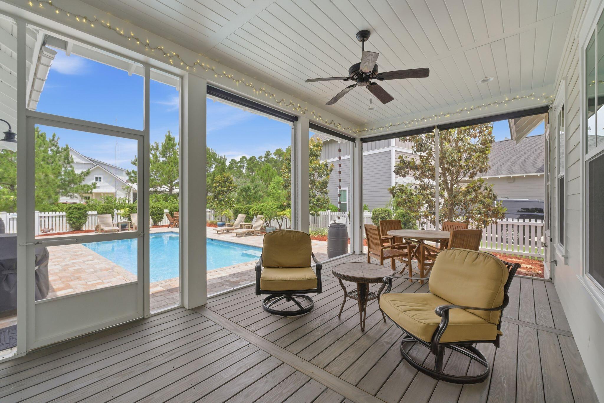 133 Sandchase Circle, Unit LOT 15 Inlet Beach, FL 32461 - Photo 32 of 47 a living room with furniture and a large window