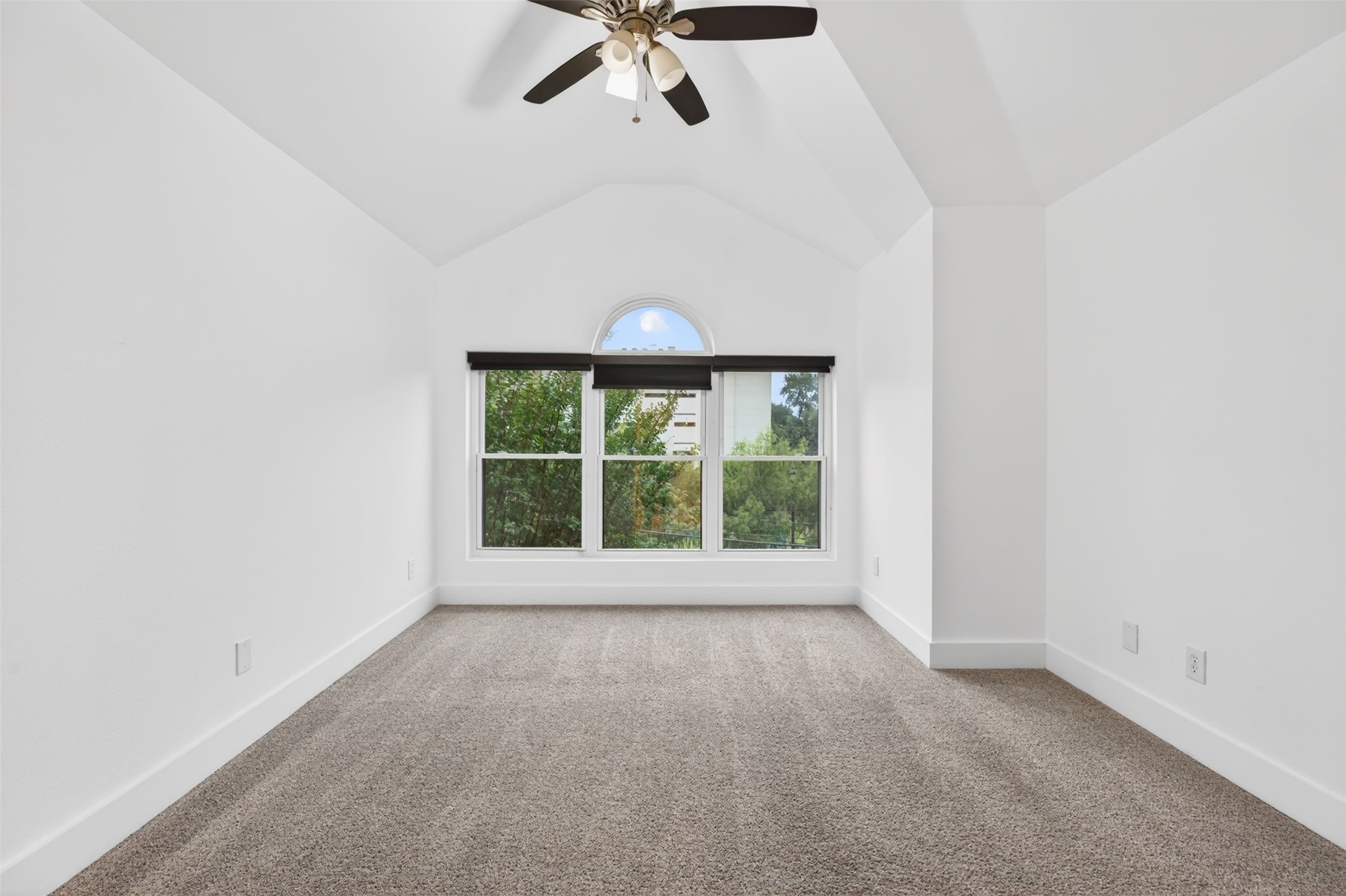 2716 Bagby Street Houston, TX 77006 - Photo 15 of 29 an empty room with a window