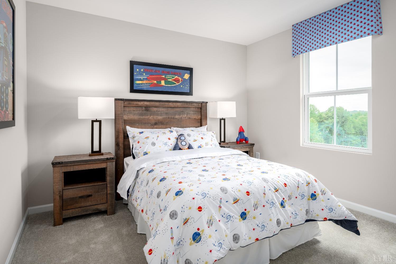 130 Robinia Road Lynchburg, VA 24501 - Photo 12 of 14 a bedroom with a bed and a painting on the wall