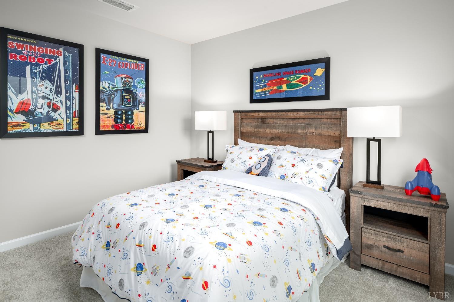 130 Robinia Road Lynchburg, VA 24501 - Photo 13 of 14 a bedroom with bed and wall painting