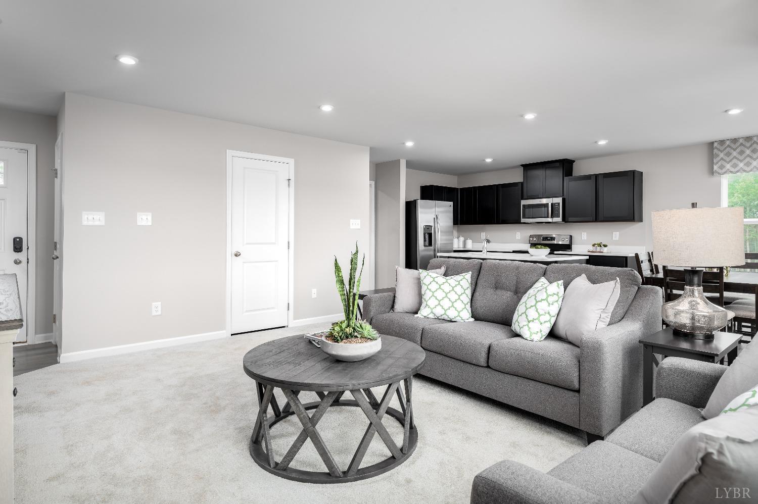 130 Robinia Road Lynchburg, VA 24501 - Photo 6 of 14 a living room with furniture and a view of kitchen