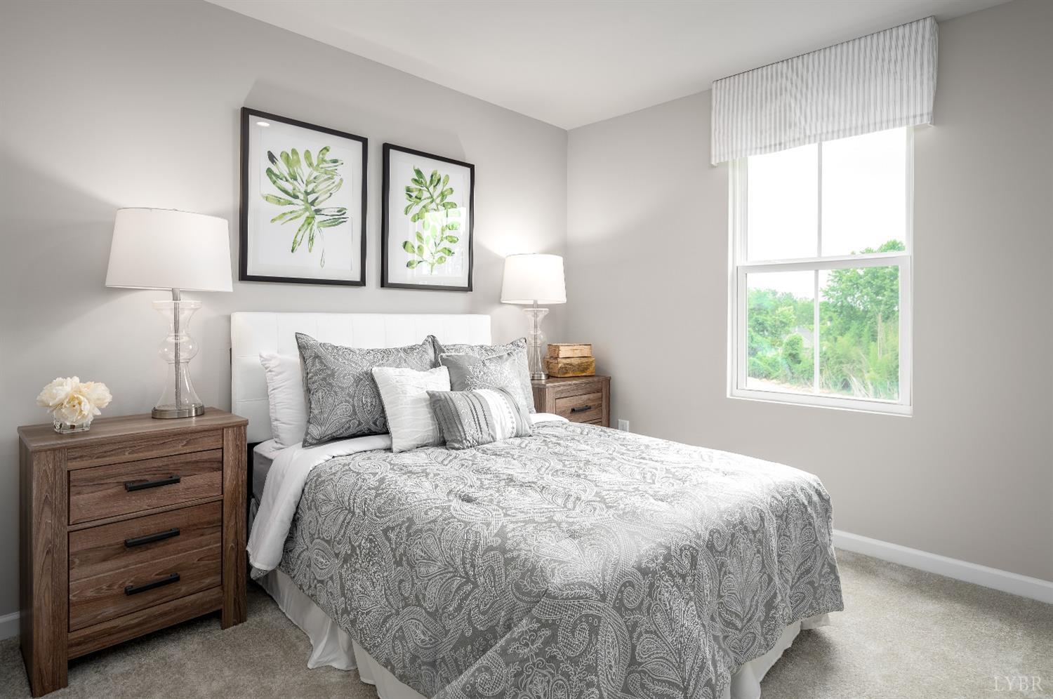 130 Robinia Road Lynchburg, VA 24501 - Photo 10 of 14 a bedroom with a bed and a window