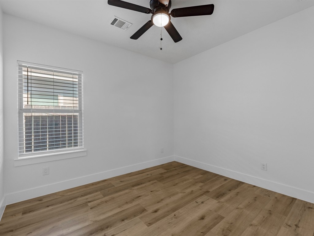 24751 Russet Bluff Trail Houston, TX 77336 - Photo 23 of 26 a view of empty room with wooden floor
