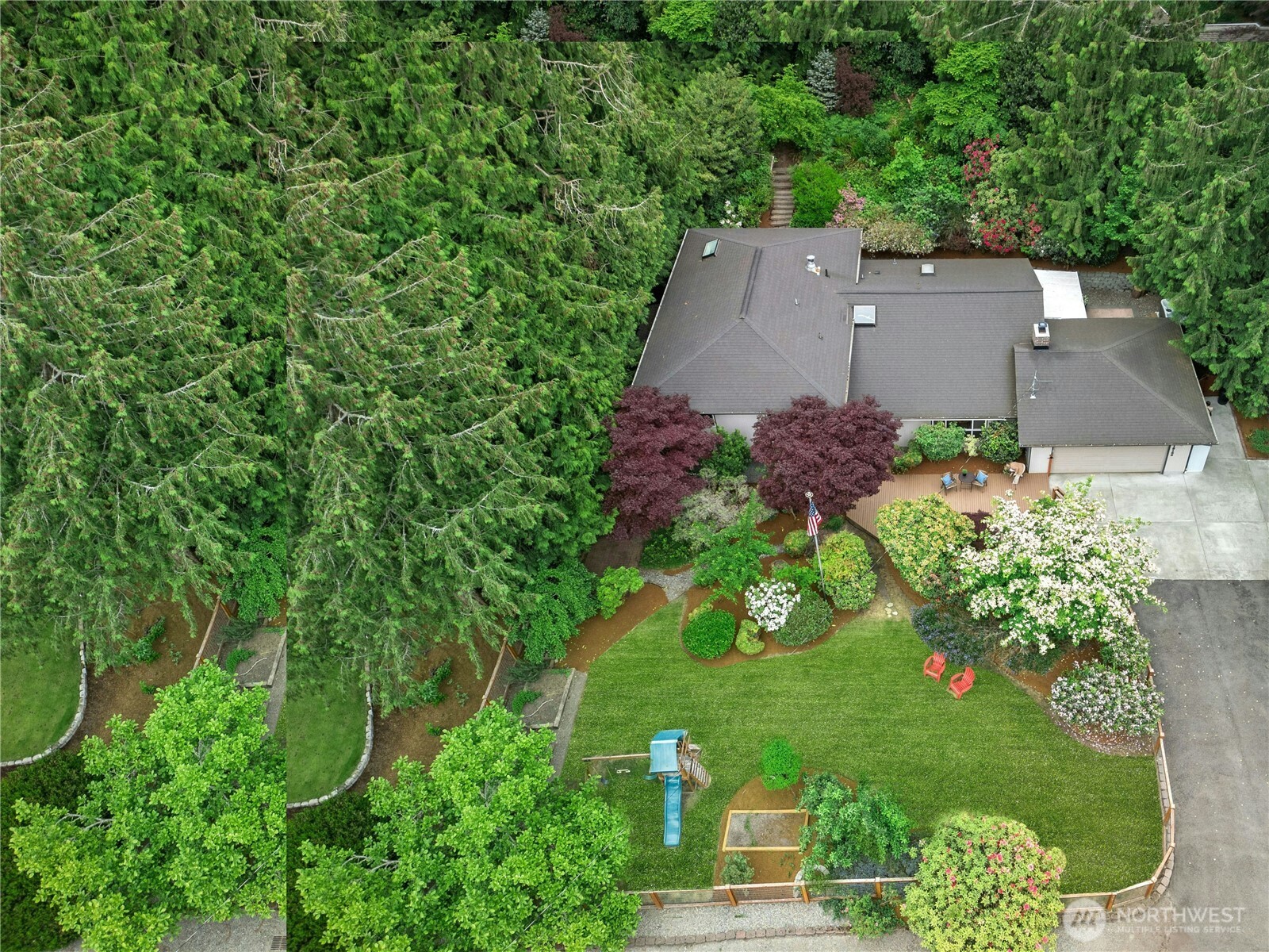 18152 145th Avenue Southeast Renton, WA 98058 - Photo 36 of 40 an aerial view of a house with a garden and yard