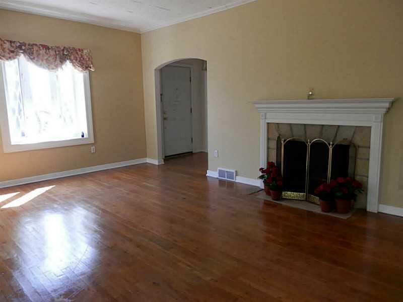 657 Beatty Road Monroeville, PA 15146 - Photo 10 of 24 Living Room. Imagine sitting reading a good book while nestle by the fireplace.