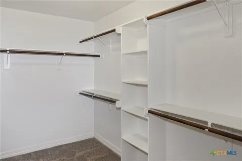 a view of small space with racks on the wall