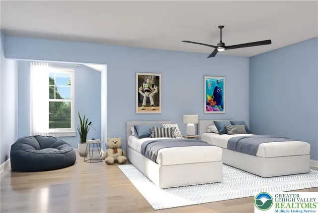 a bedroom with a bed and ceiling fan