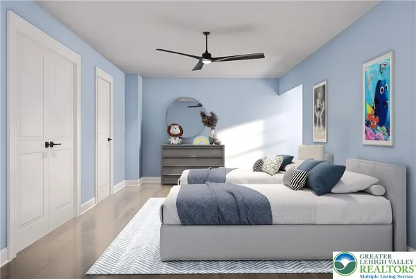 a bedroom with a bed and ceiling fan