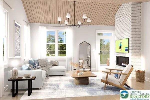 a living room with furniture a flat screen tv and a large window