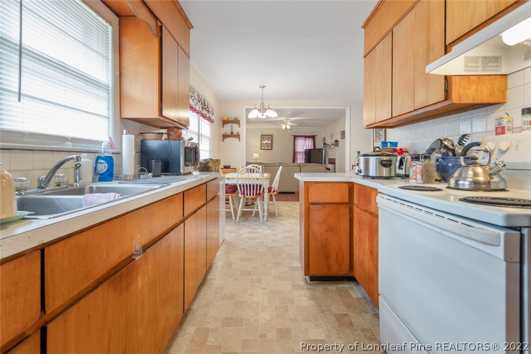 418 Pine Lake Park Road Pembroke, NC 28372 - Photo 10 of 19 a kitchen with lots of counter top space