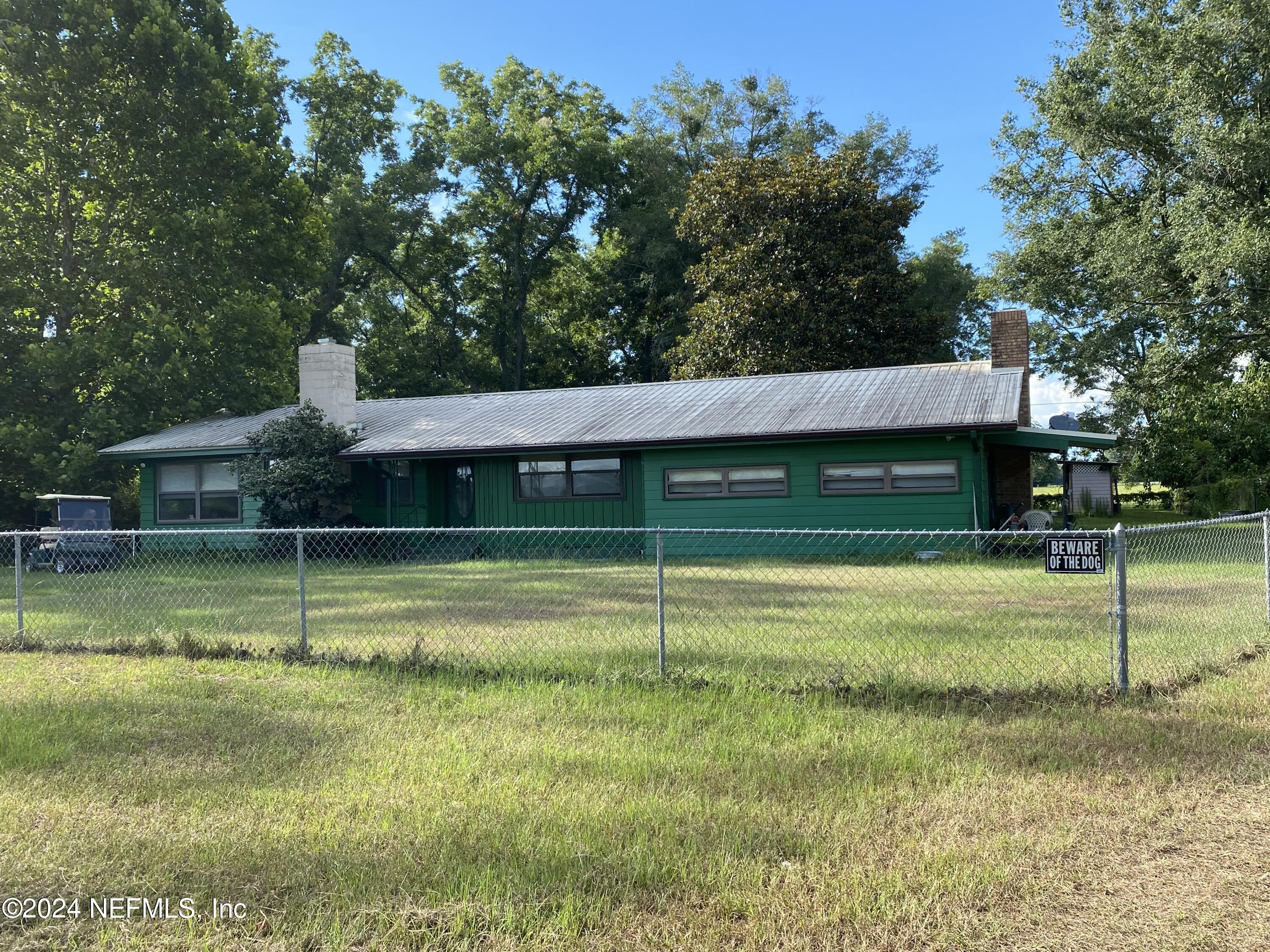 9005 US 90 Lee, FL 32059 - Photo 14 of 19 a view of a house with a yard