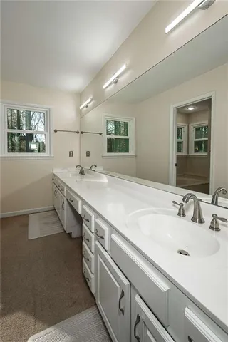 a bathroom with a shower and a toilet