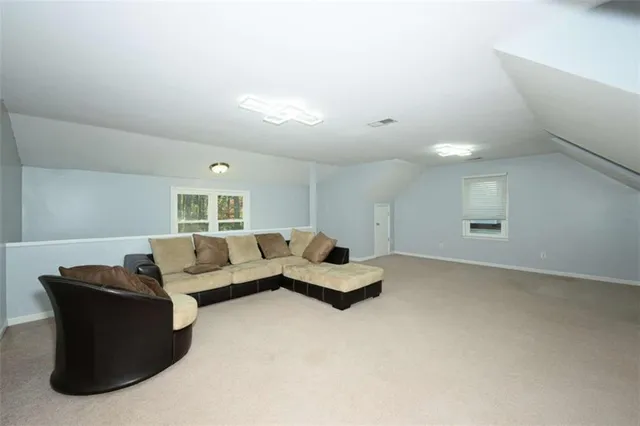 a living room with furniture and a couch