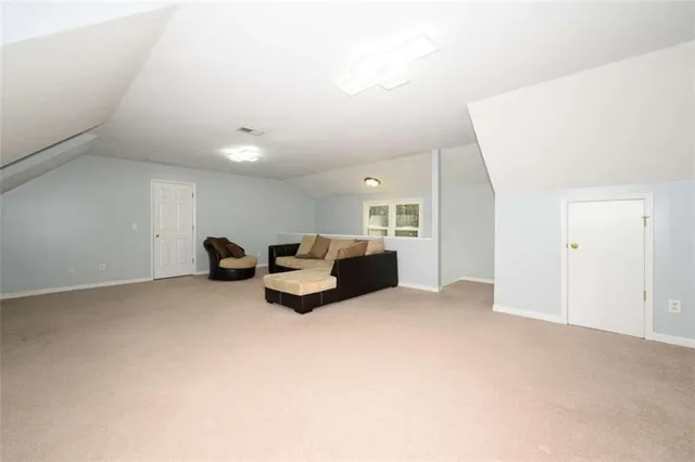 a view of a livingroom with furniture