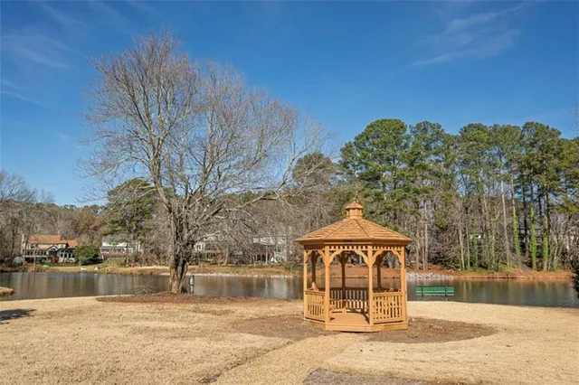 a view of a lake with mountain