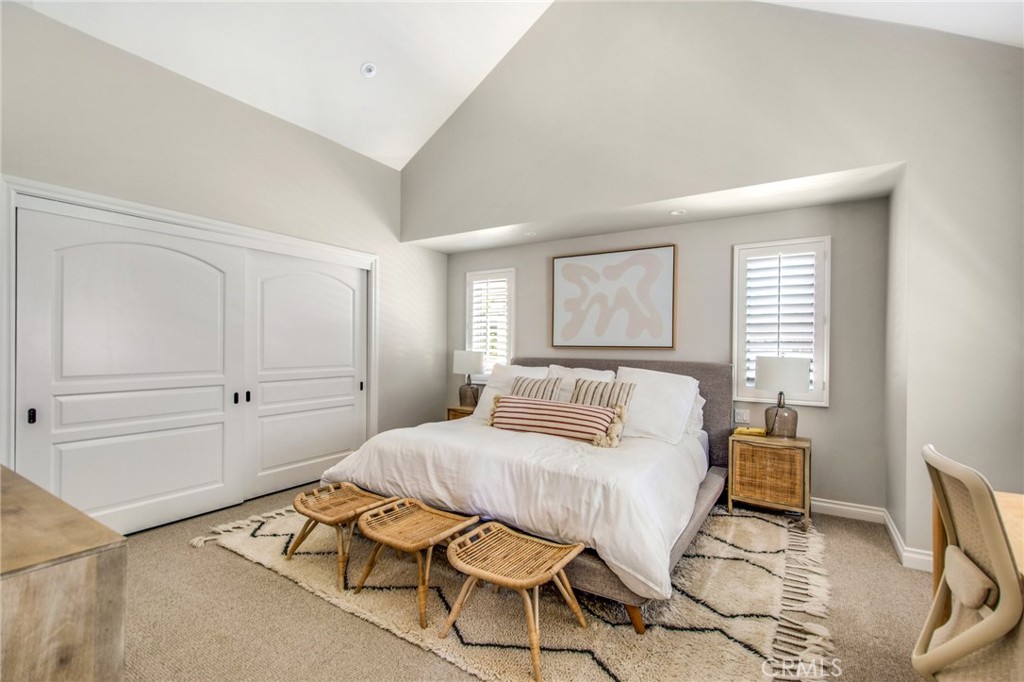 225 16th Place Costa Mesa, CA 92627 - Photo 15 of 43 a bedroom with a bed and window