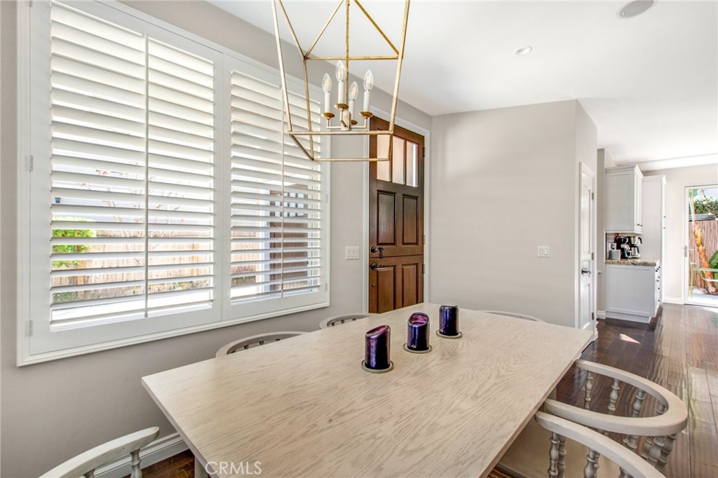 225 16th Place Costa Mesa, CA 92627 - Photo 22 of 43 a dining room with a window