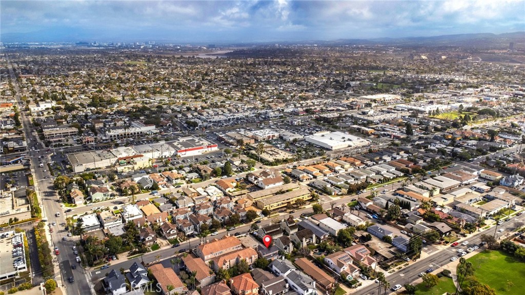 225 16th Place Costa Mesa, CA 92627 - Photo 37 of 43 an aerial view of residential building with parking space