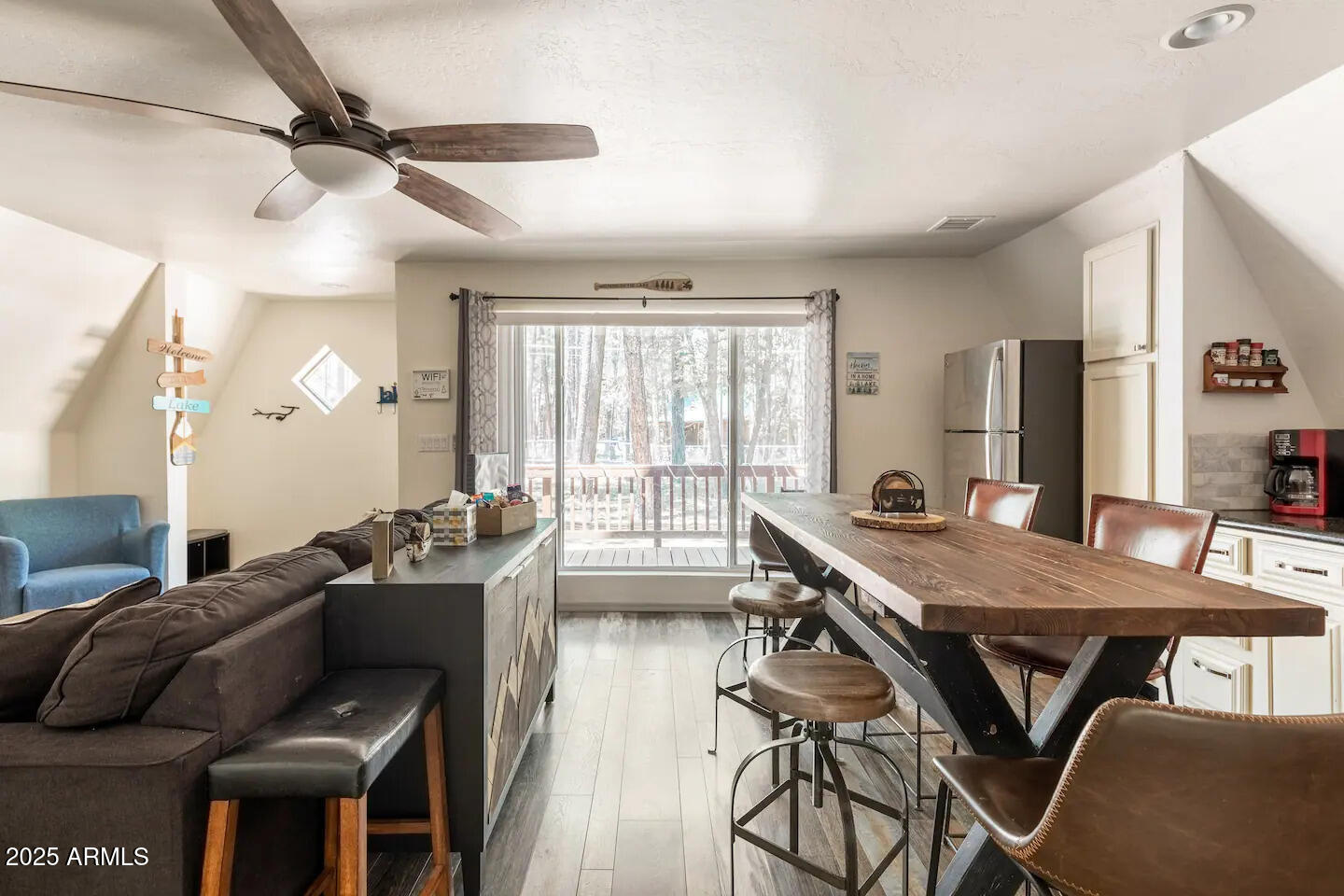 435 Southlake Road Lakeside, AZ 85929 - Photo 11 of 30 a view of a dining room with furniture window and wooden floor