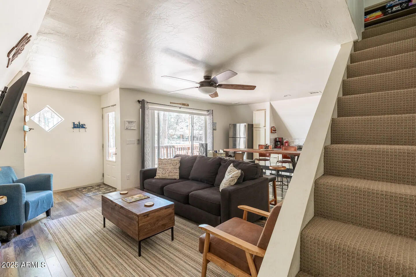435 Southlake Road Lakeside, AZ 85929 - Photo 12 of 30 a living room with furniture and wooden floor