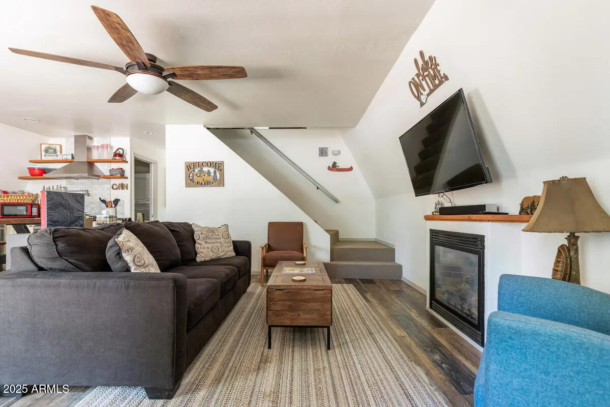 435 Southlake Road Lakeside, AZ 85929 - Photo 15 of 30 a living room with furniture and a flat screen tv