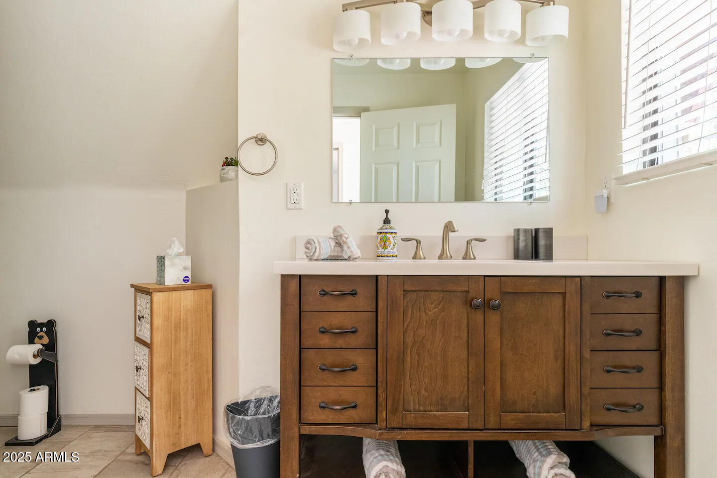 435 Southlake Road Lakeside, AZ 85929 - Photo 18 of 30 a bathroom with a sink vanity and mirror