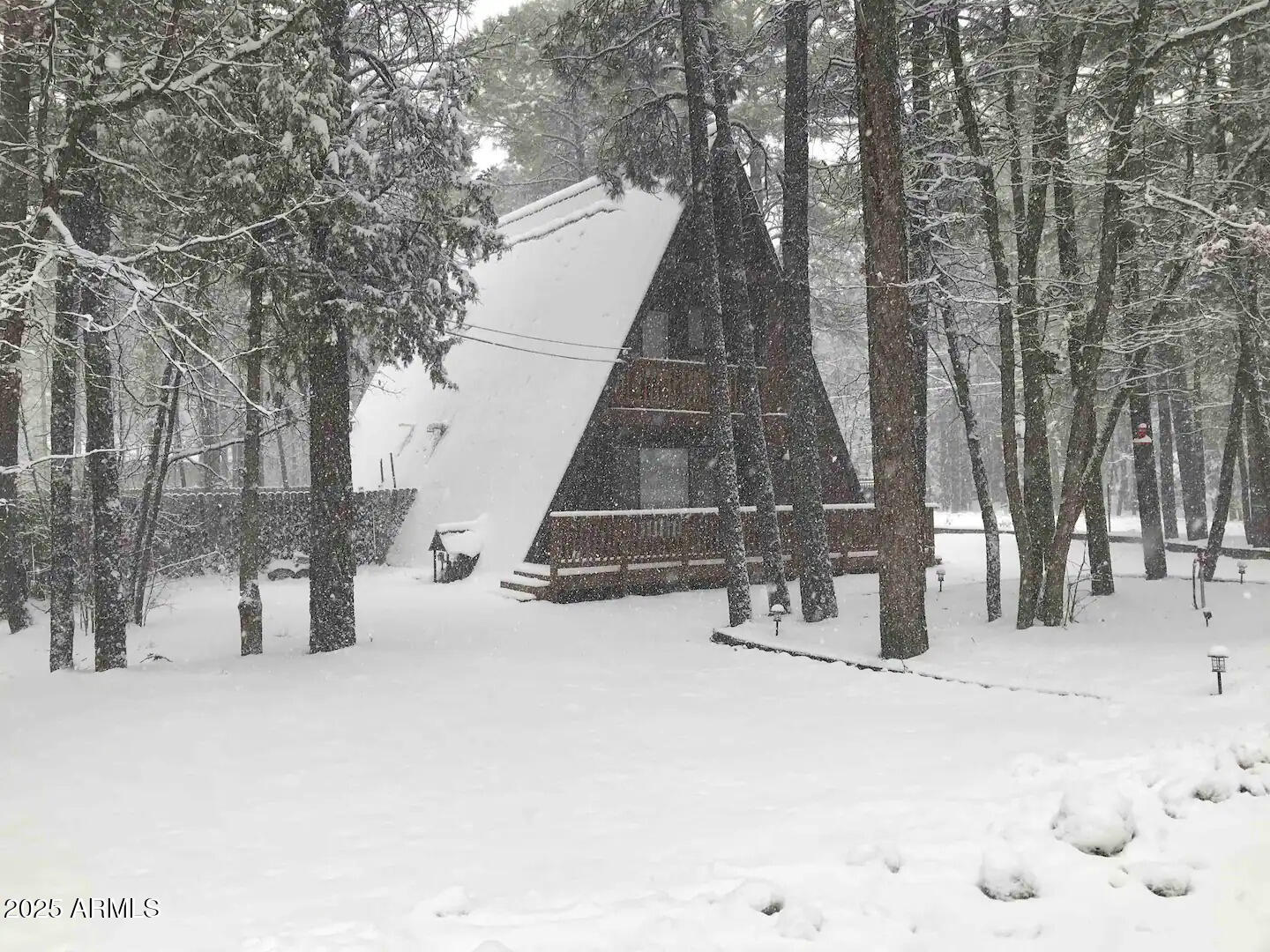 435 Southlake Road Lakeside, AZ 85929 - Photo 30 of 30 a wooden bench sitting in the middle of a building