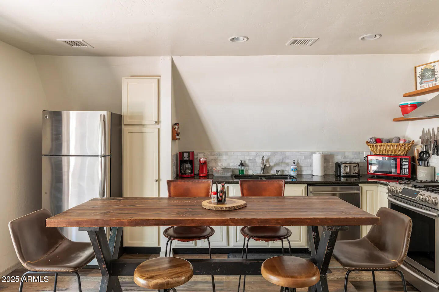 435 Southlake Road Lakeside, AZ 85929 - Photo 10 of 30 a dinning table and chairs in a kitchen