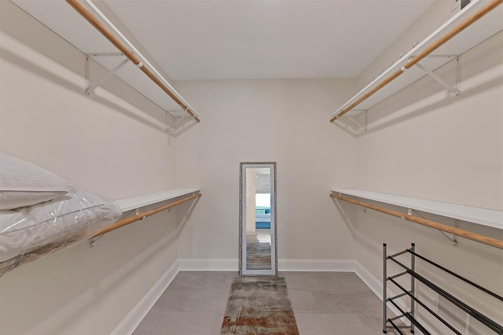 9397 Midnight Pass Road, Unit 501 Sarasota, FL 34242 - Photo 22 of 45 a view of entryway with stairs and wooden floor