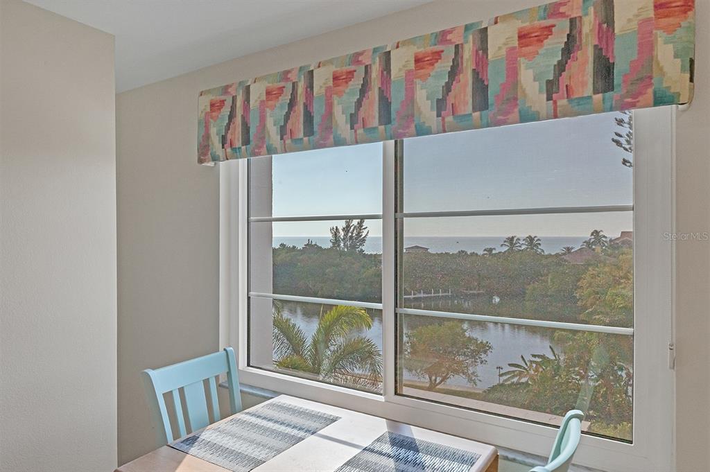 9397 Midnight Pass Road, Unit 501 Sarasota, FL 34242 - Photo 24 of 45 a view of wooden balcony