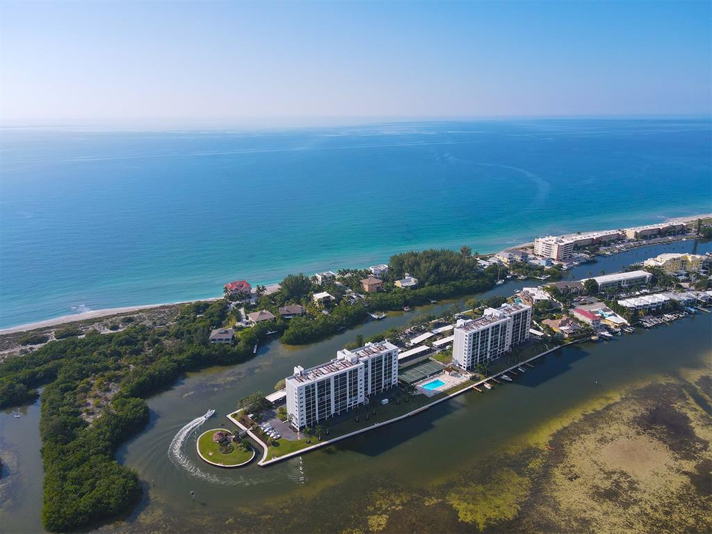 9397 Midnight Pass Road, Unit 501 Sarasota, FL 34242 - Photo 41 of 45 an aerial view of a house with a ocean view
